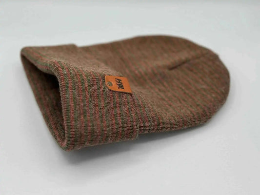 Burgundy/green contrast cuff beanie folded, showing ribbed knit and orange logo tag