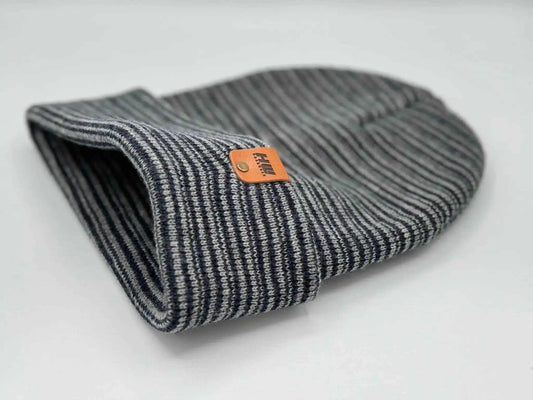 Folded beanie, gray and navy striped knit with orange logo patch on cuff