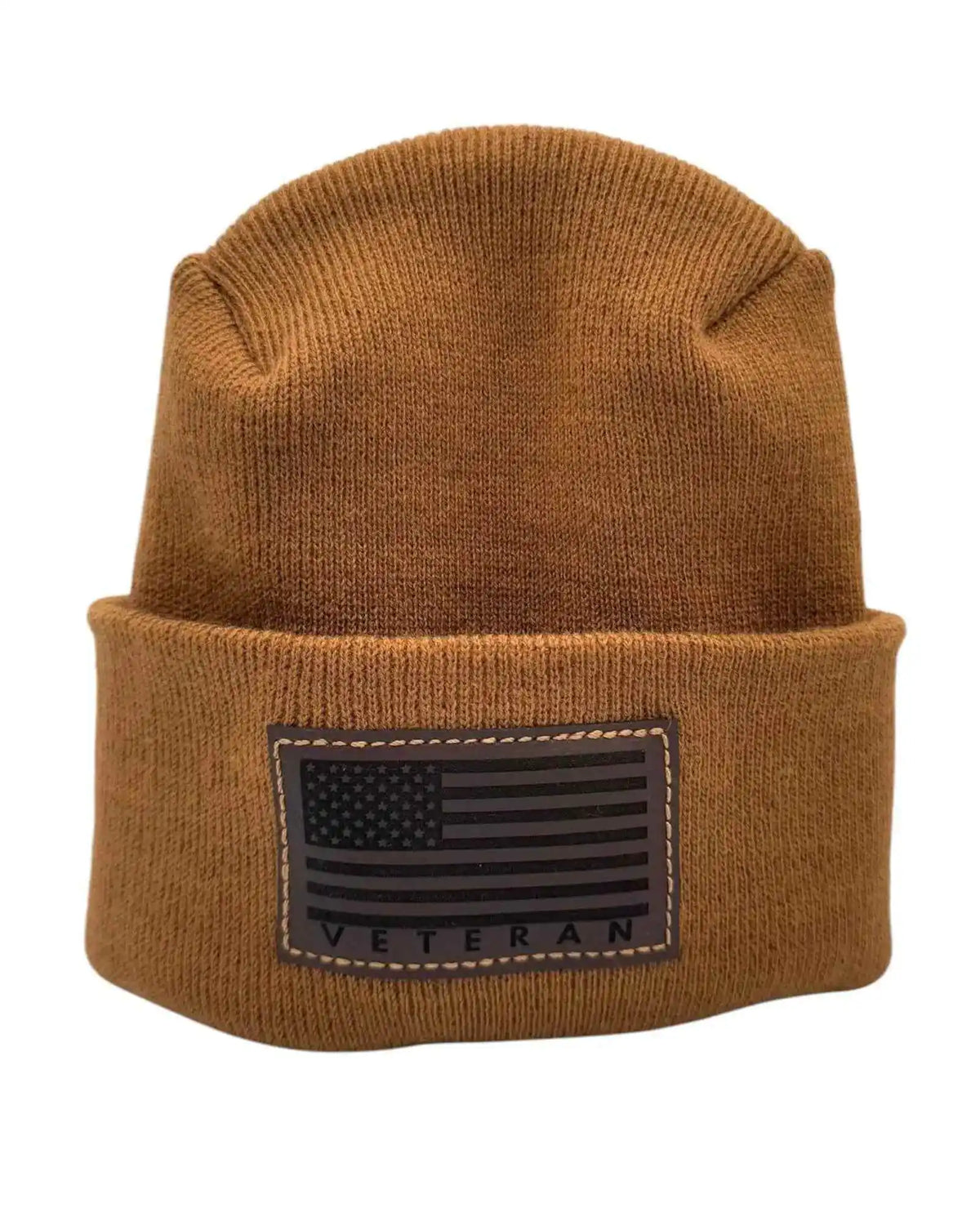 Camel brown knit cuffed beanie with rectangular Veteran patch.