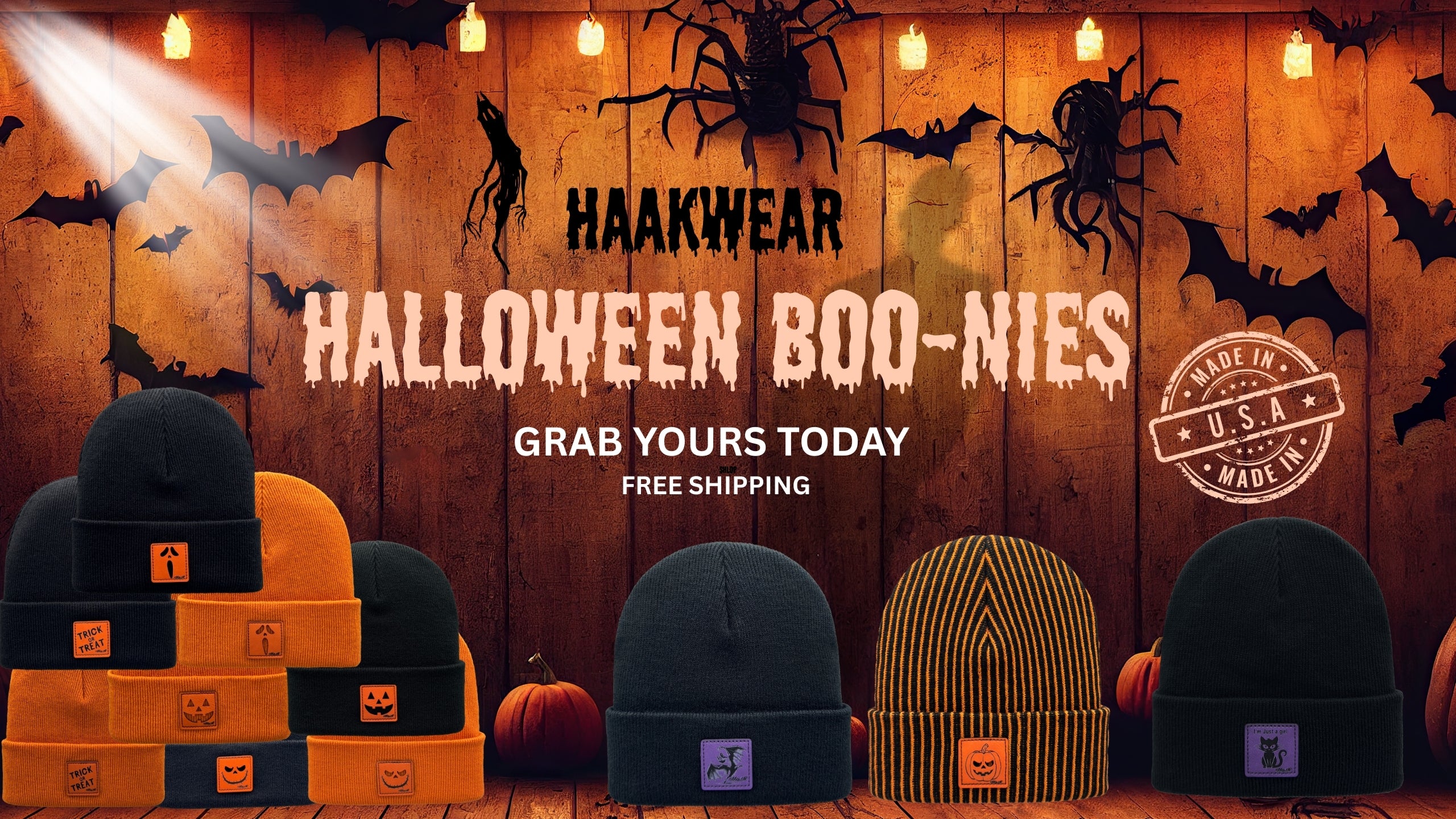Halloween-themed Haakwear winter beanies display with hats and pumpkins on a wooden background.