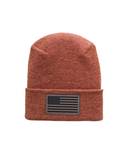Rust knit beanie with American flag patch at cuff
