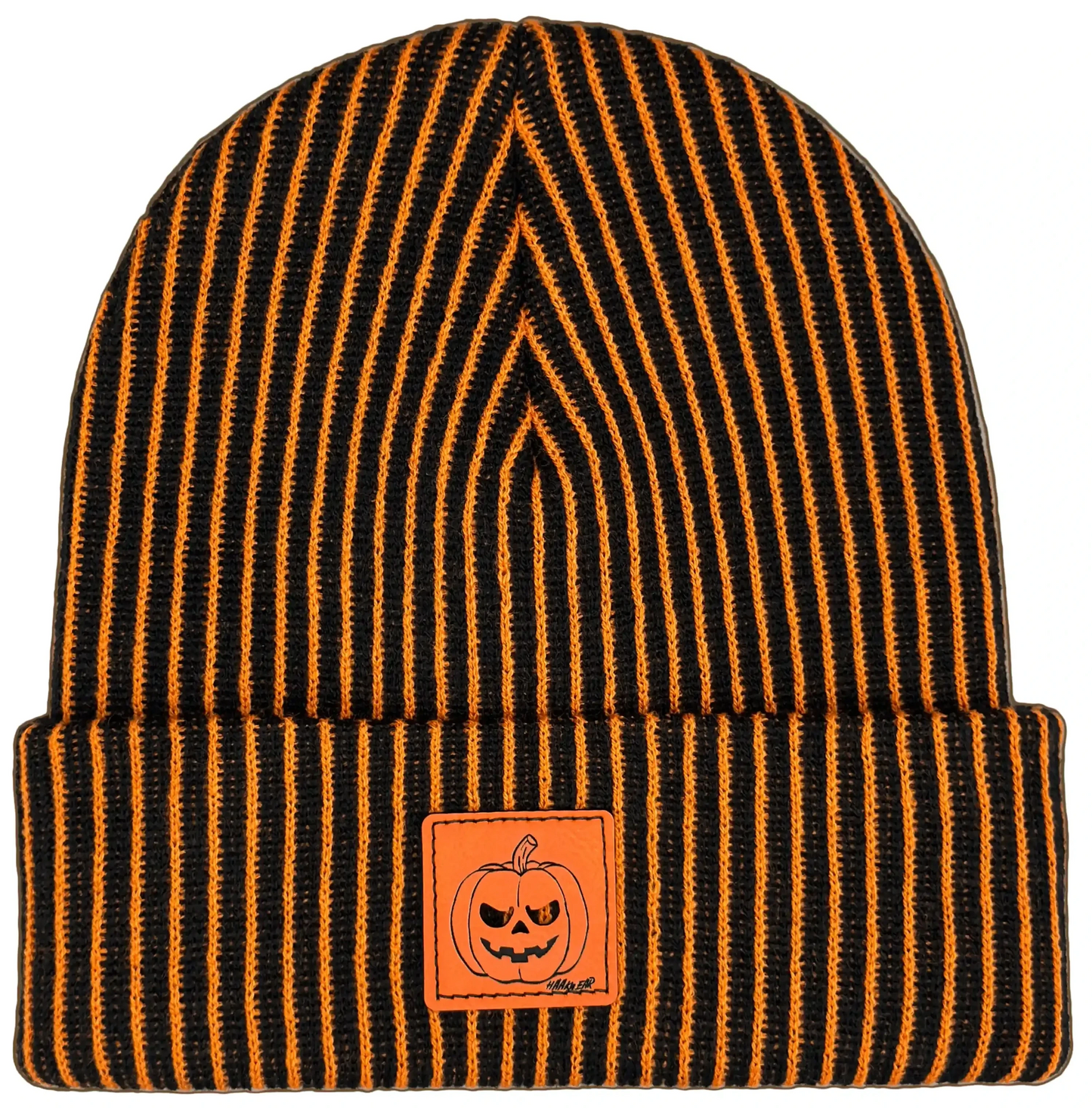 Striped knit beanie with jack-o-lantern patch, dark orange and black.