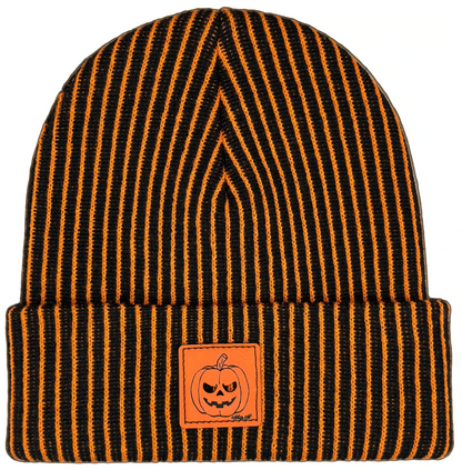 Striped knit beanie with jack-o-lantern patch, dark orange and black.