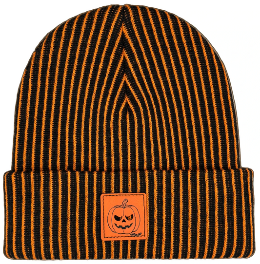 Striped knit beanie with jack-o-lantern patch, dark orange and black.
