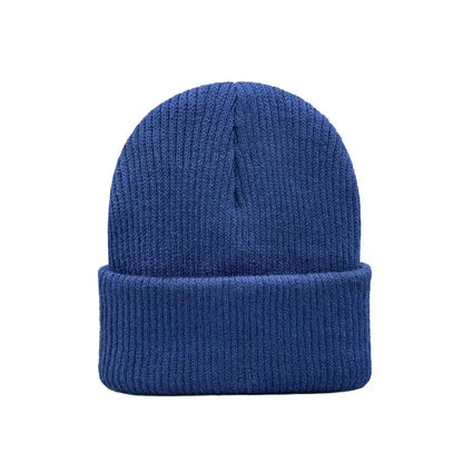 Solid blue knit kids beanie with folded cuff and ribbed knit texture