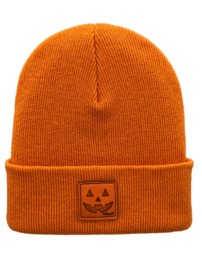 Orange knit Halloween beanie with jack-o-lantern emblem patch on the cuff
