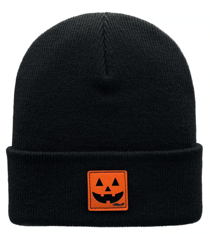Black Halloween beanie with orange jack-o'-lantern patch and folded cuff