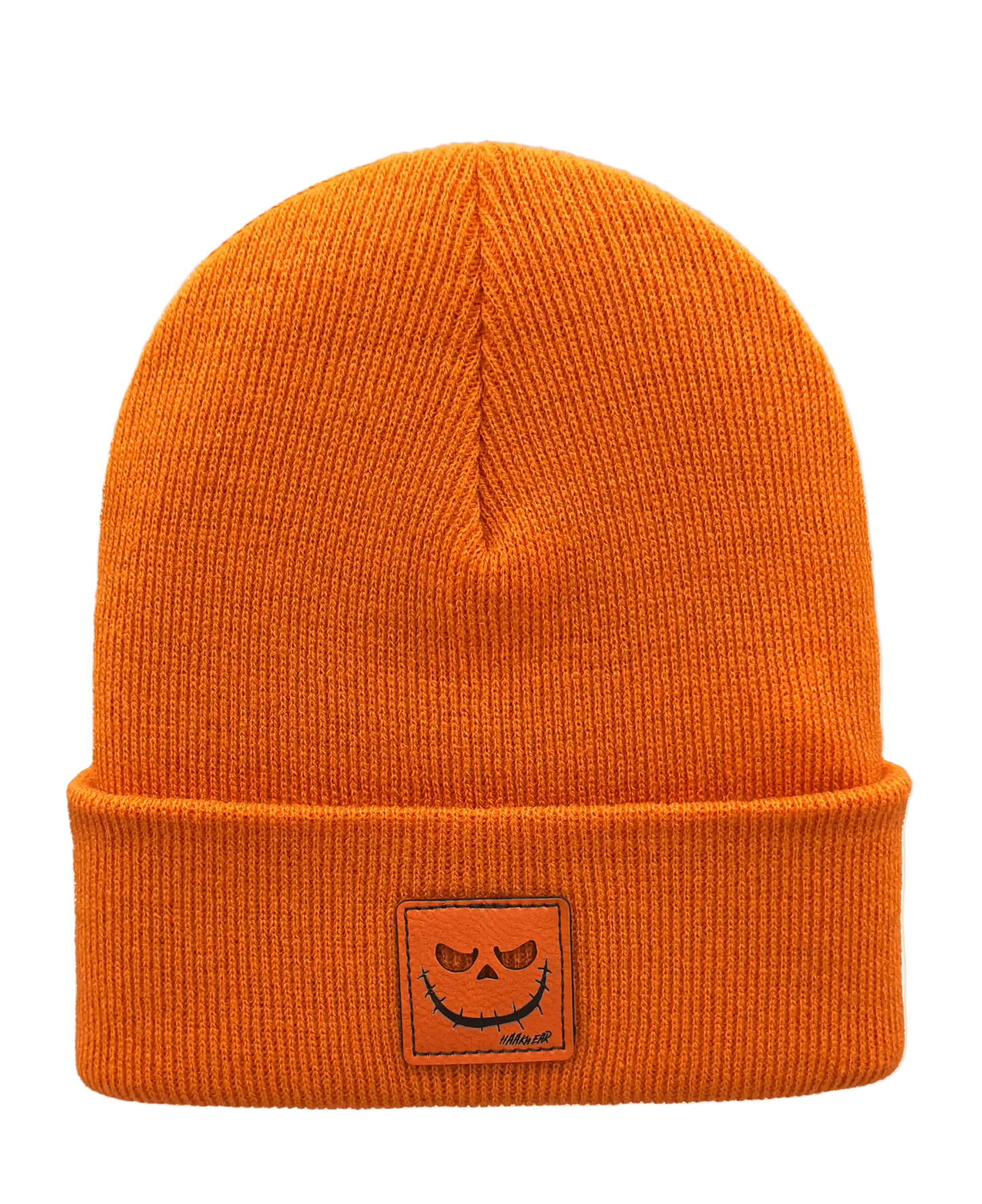 Orange knit beanie with jack-o-lantern patch on cuff