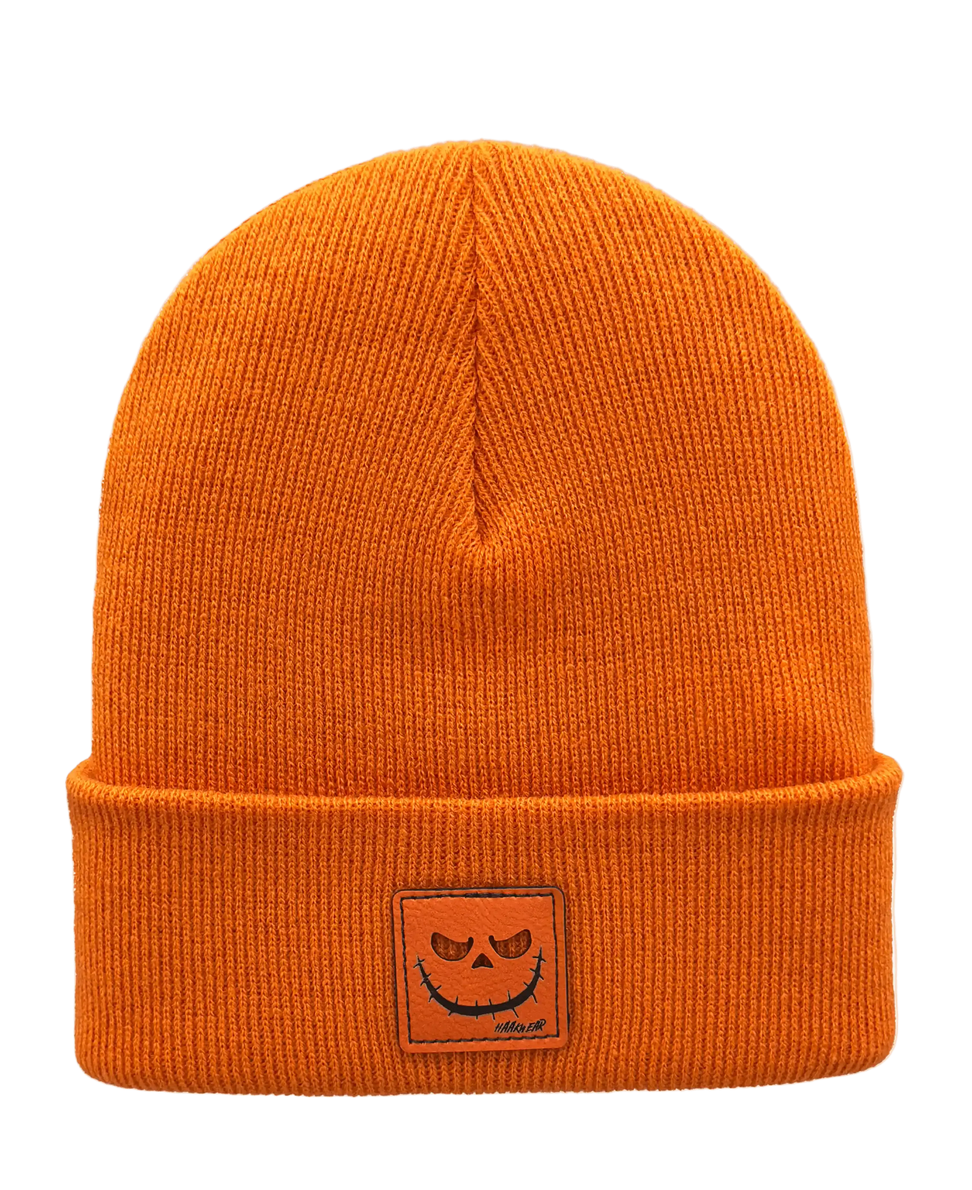 Orange knit beanie with jack-o-lantern patch on cuff