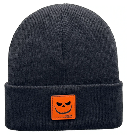 Dark knit beanie with orange Reaper grin patch front