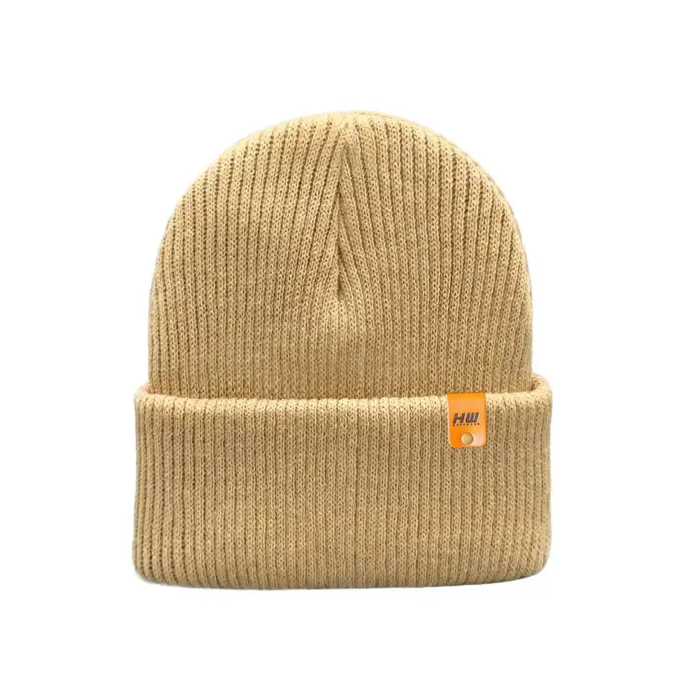 Kids cuffed knit beanie in beige with small logo tag on cuff