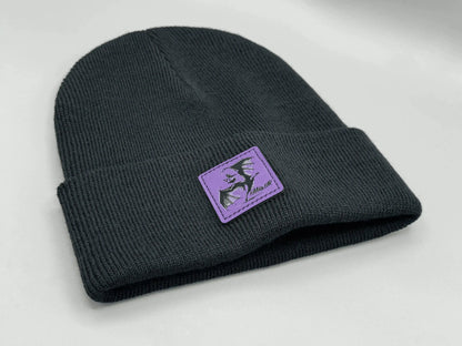 Dark navy knit beanie with purple square logo patch on the side