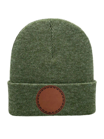 Forest green knit beanie with folded cuff and round logo patch at the front.