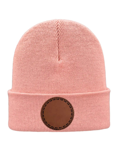 Light pink knit beanie with folded cuff and round logo patch at the front.