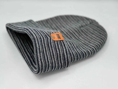 Folded beanie, gray and navy striped knit with orange logo patch on cuff