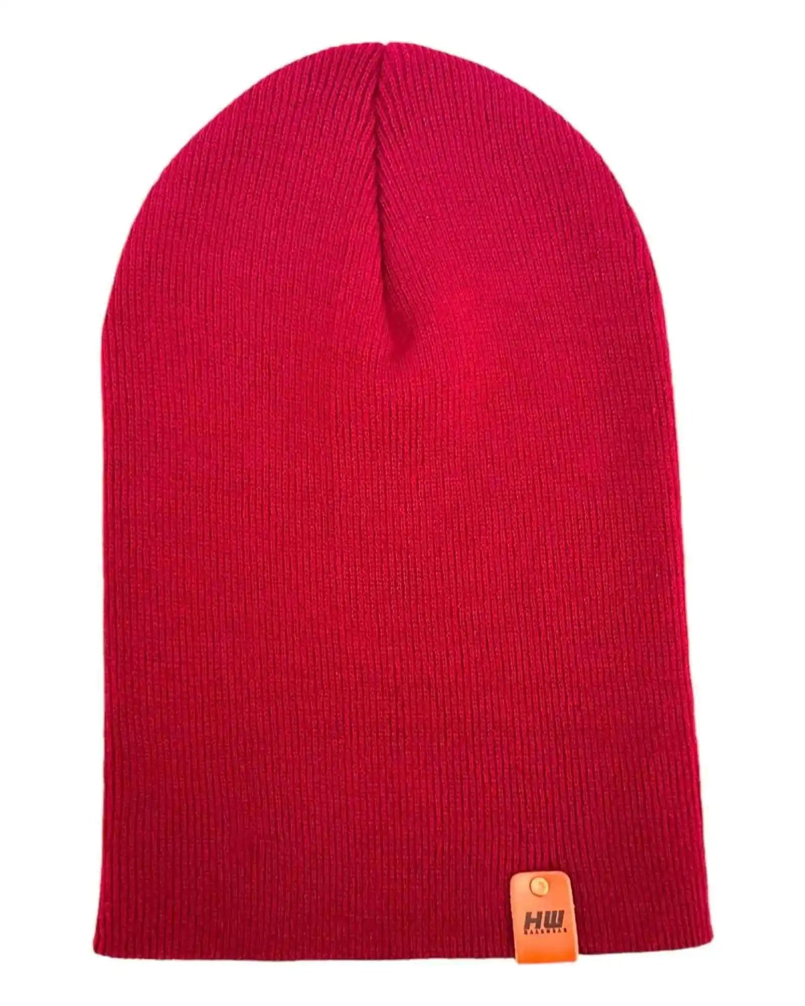 Berry red knit beanie with ribbed texture and small logo patch at hem