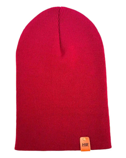 Berry red knit beanie with ribbed texture and small logo patch at hem