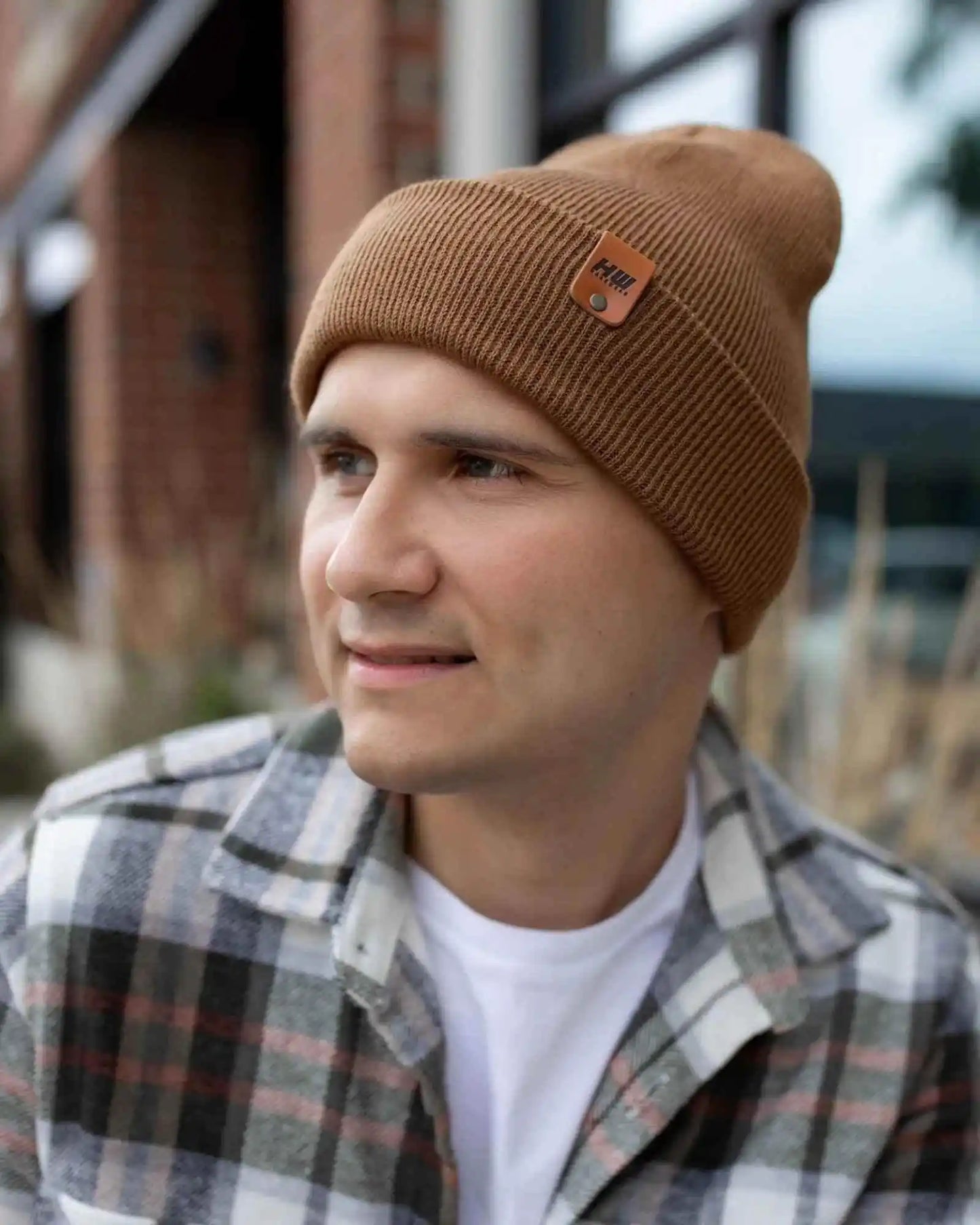 Camel brown ribbed knit beanie with cuff and small leather logo patch