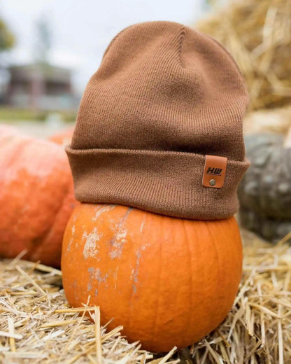 Camel brown cuffed knit beanie, folded brim with small logo patch