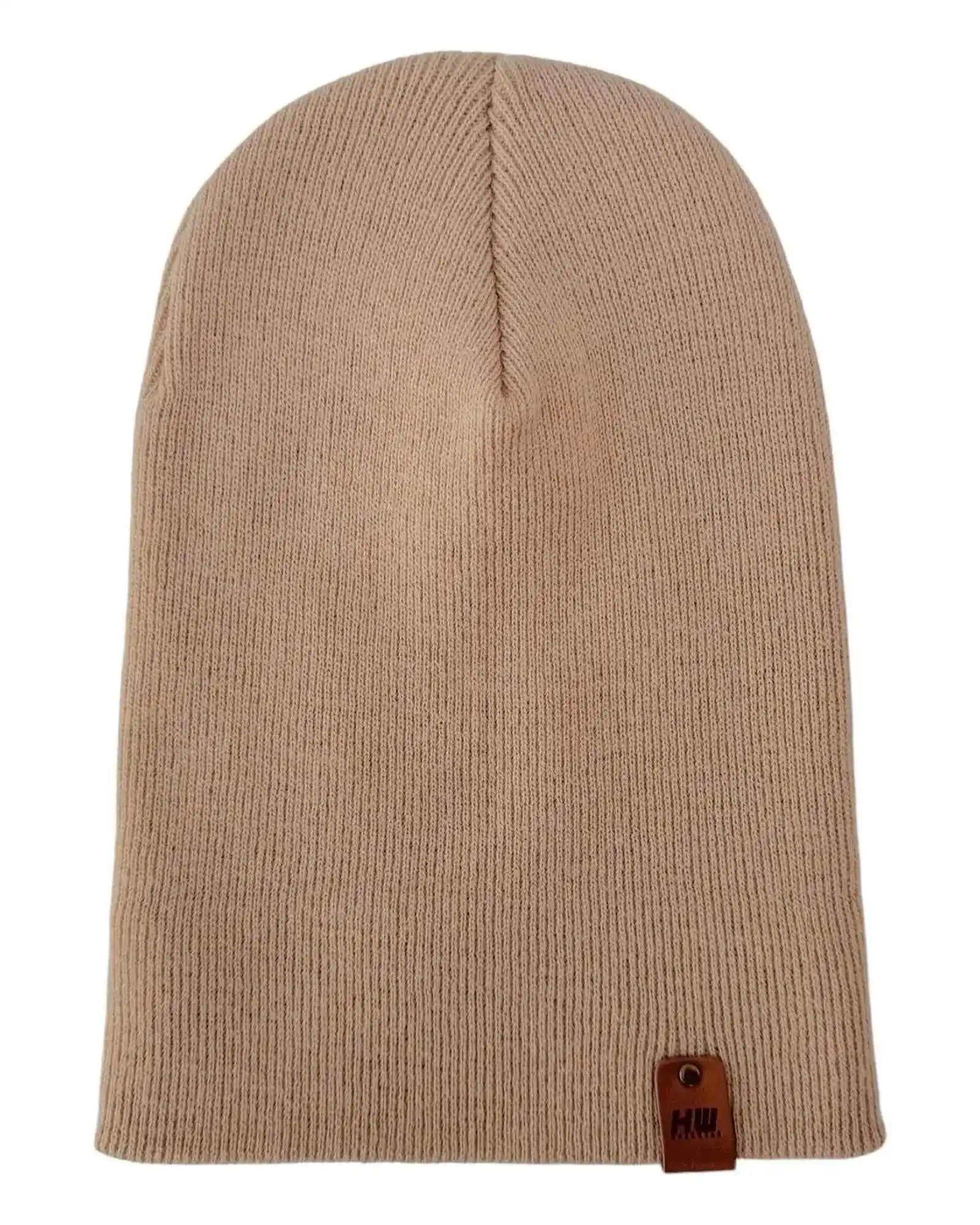 Dune beige knit beanie with vertical seam and small brand label at hem