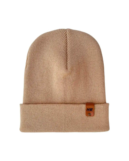Dune beige knit cuffed beanie with woven brand patch on cuff