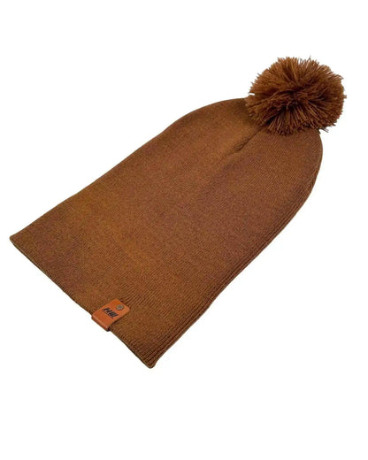 Camel brown pom pom beanie folded open, knit cuff and orange label patch