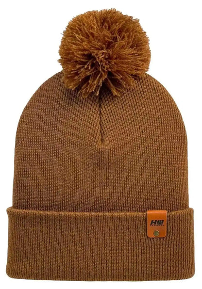 Camel brown cuffed pom pom beanie hat with folded cuff and logo patch