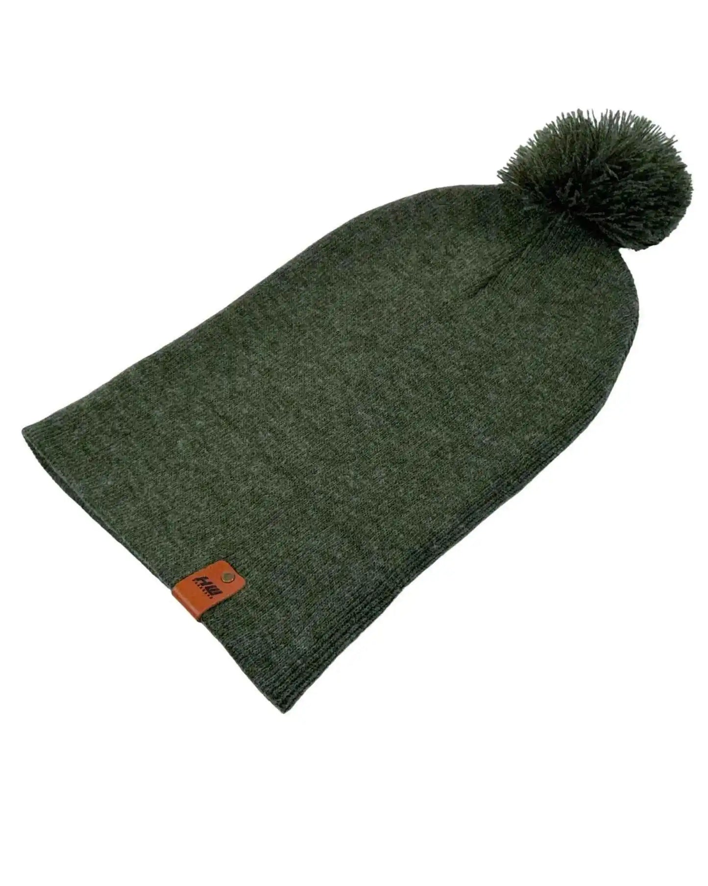 Forest green knit beanie with pom pom and cuff, orange logo patch