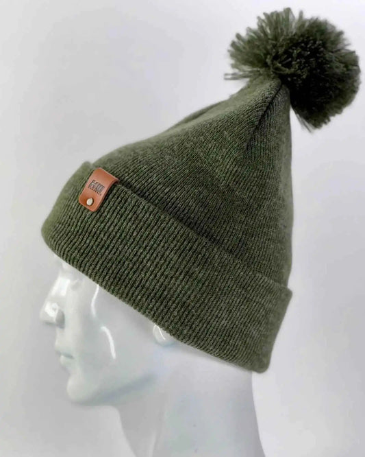 Side view forest green knit beanie with cuff, pom pom top, orange logo patch