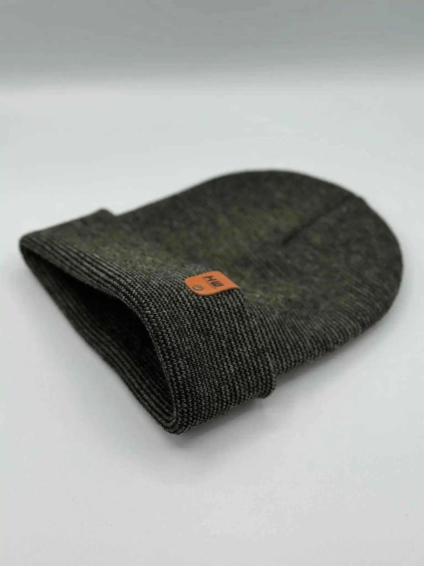 Folded knit cuff beanie with orange brand label patch