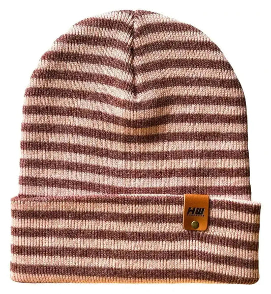 Burgundy and pink striped knit beanie with folded cuff and leather-look logo patch