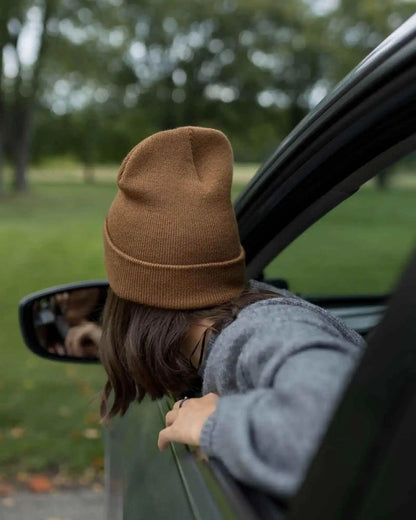 Camel brown knit cuff beanie worn on head