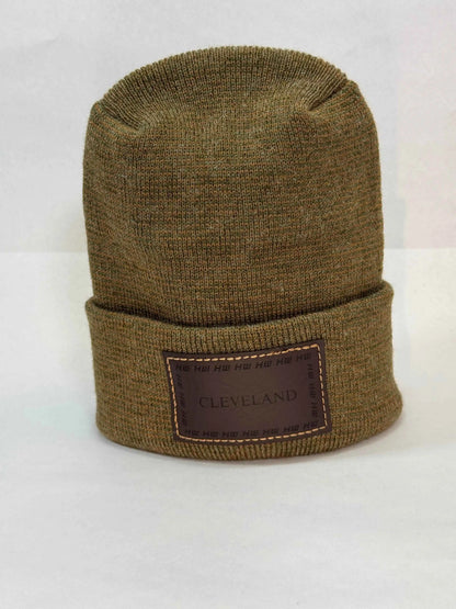 Brown knit beanie with folded cuff and rectangular Cleveland patch logo