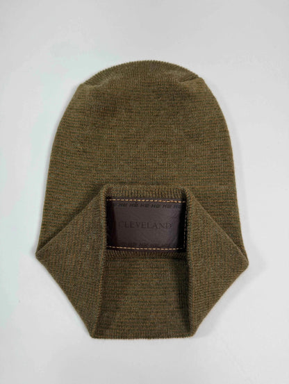 Brown knit beanie with folded cuff and stitched Cleveland patch at center front