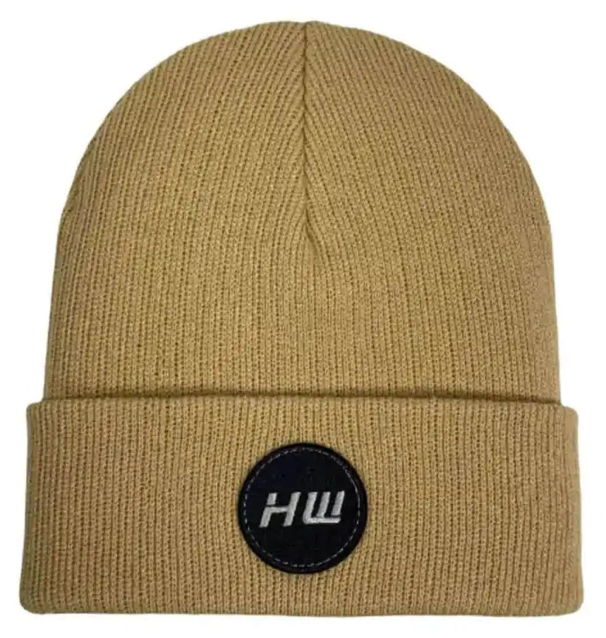 Dune beige knit beanie with folded cuff and round HUL logo patch