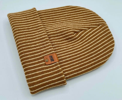 Folded beige and brown striped rib beanie with fold-up cuff and leather logo patch