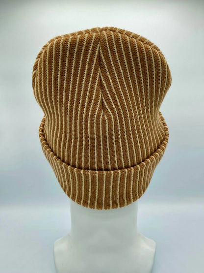 Beige and brown striped rib beanie on head form with fold-up cuff and knit logo patch