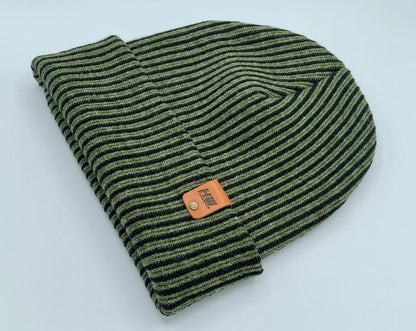 Folded green striped beanie with wide cuff and brown leather label at center