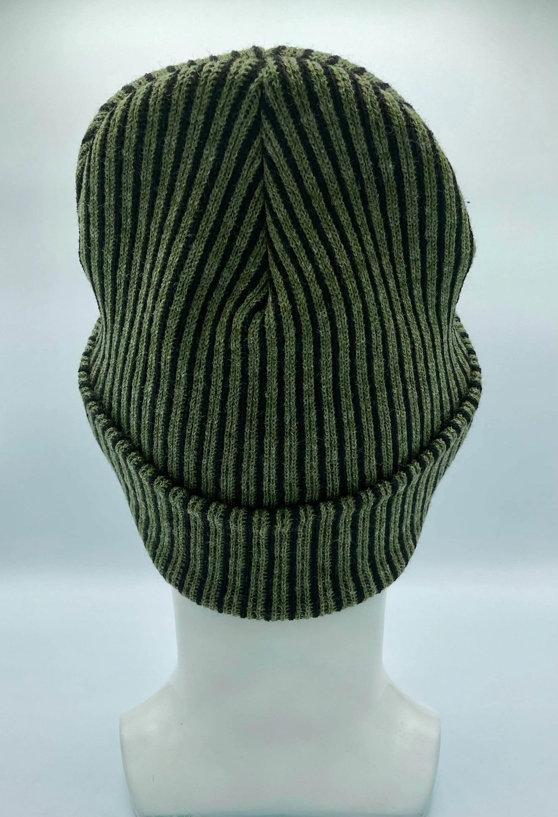 Green ribbed striped beanie with wide cuff, rounded top with vertical seam detail