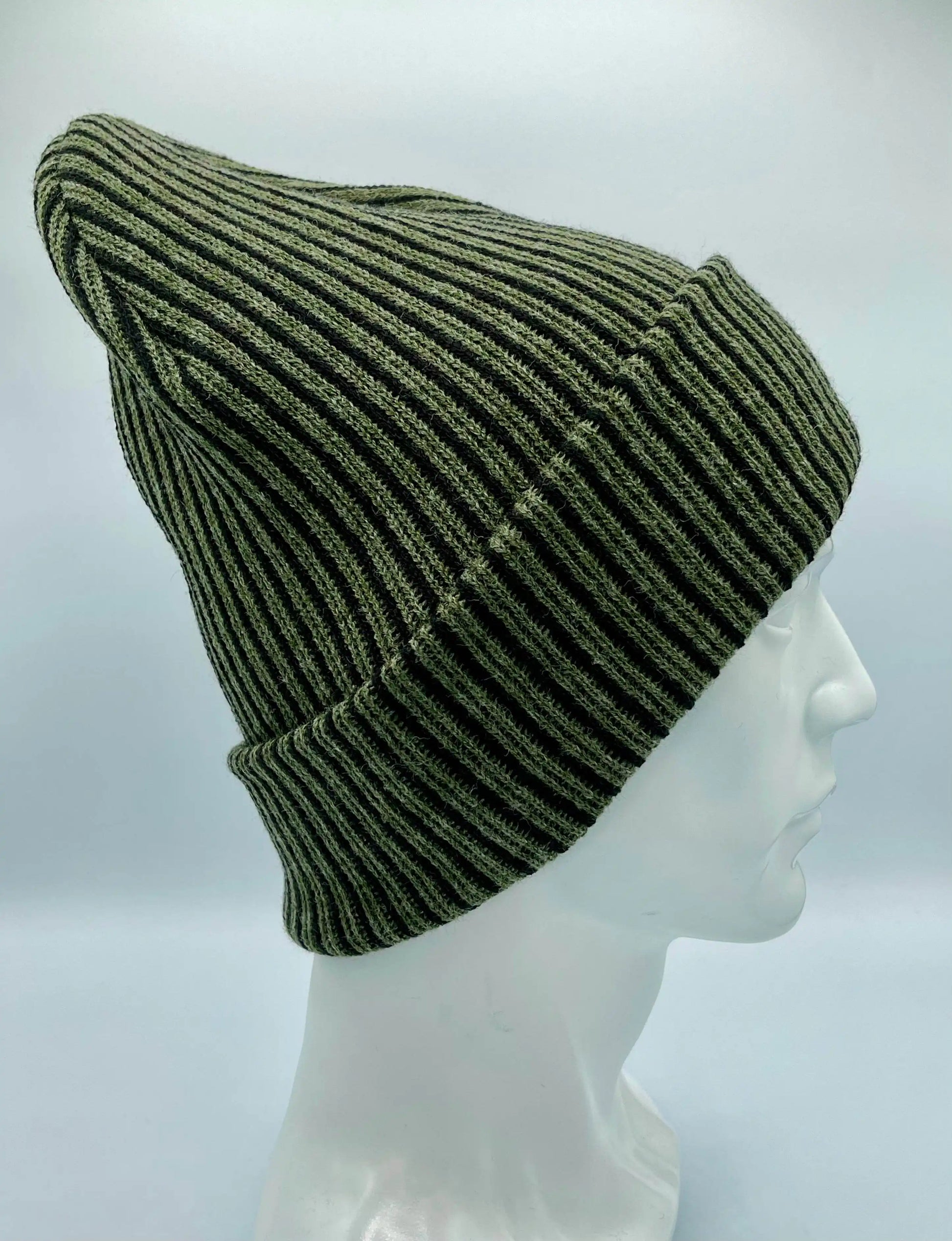 Green ribbed striped beanie with wide cuff, dark contrast stripes