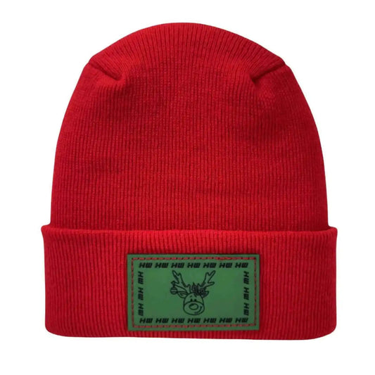 Red knit beanie with rectangular green reindeer patch on cuff