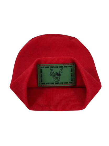 Red knit beanie with green reindeer patch, folded brim view