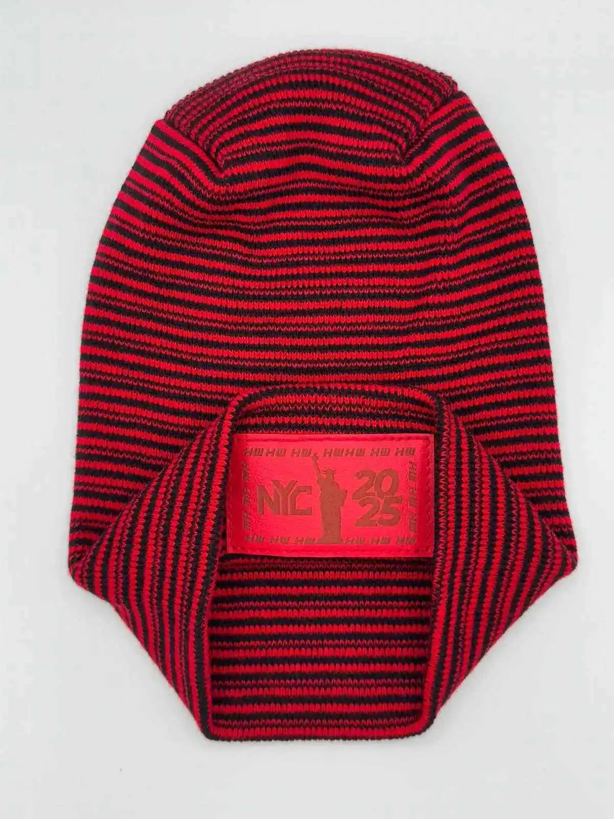 Cuffed knit beanie with red and black stripes, front NYC 25 logo patch detail