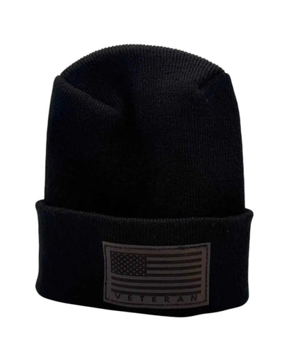 Cuffed knit beanie in dark navy with a Veterans flag patch on the cuff