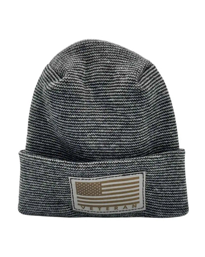 Black-and-white striped cuffed beanie with rectangular Veteran patch.