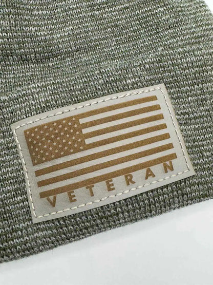 Olive knit cuffed beanie with Veterans flag patch