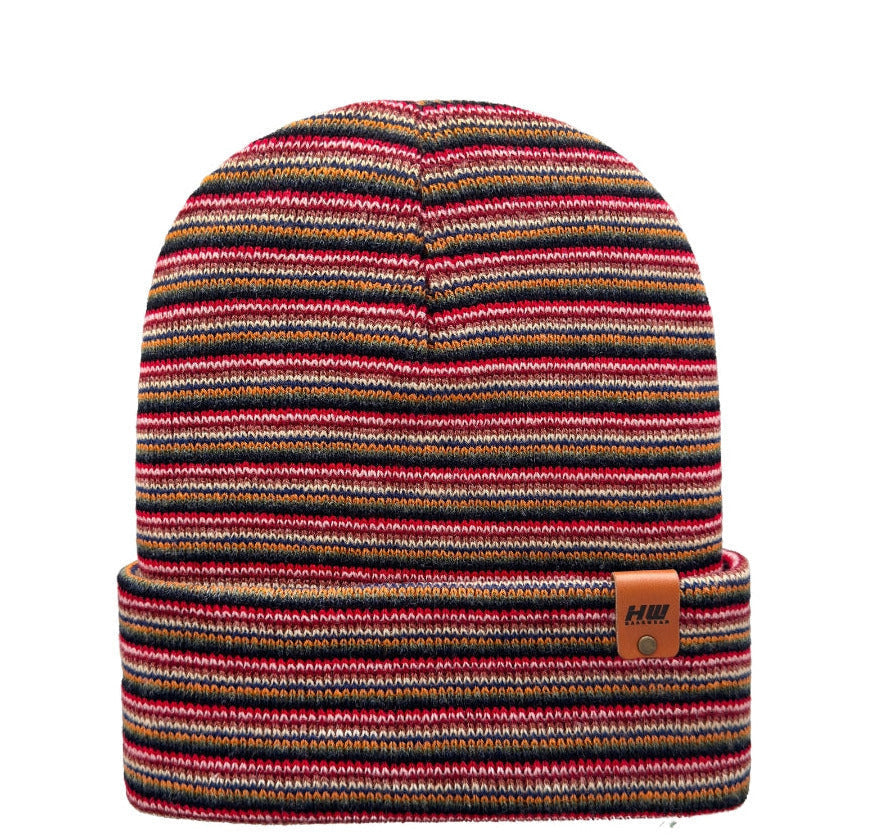 Multicolored striped beanie with a brand logo on a white background