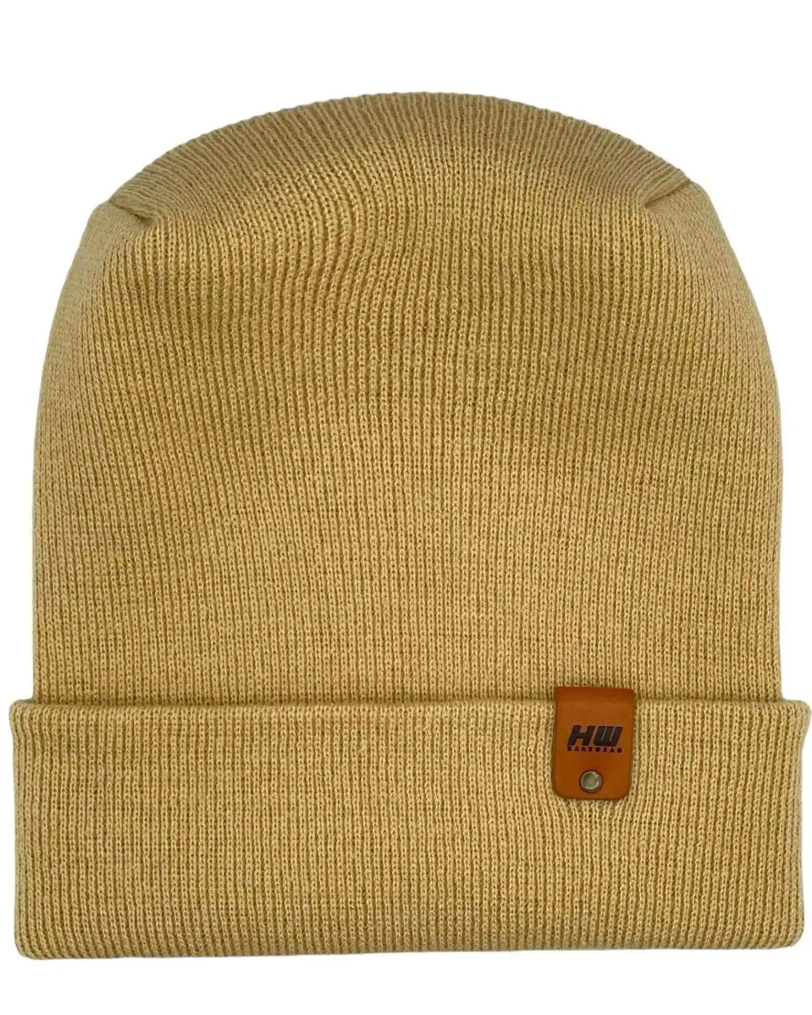 Dune beige knit cuffed beanie with rectangular logo patch on cuff
