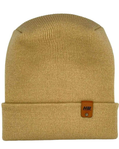 Dune beige knit cuffed beanie with rectangular logo patch on cuff