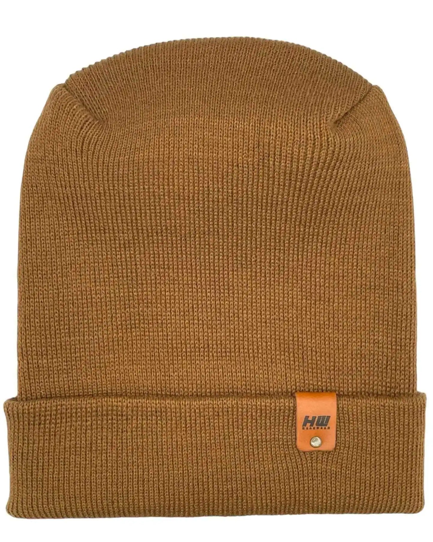 Camel tan ribbed knit beanie with folded cuff and small brown logo patch.